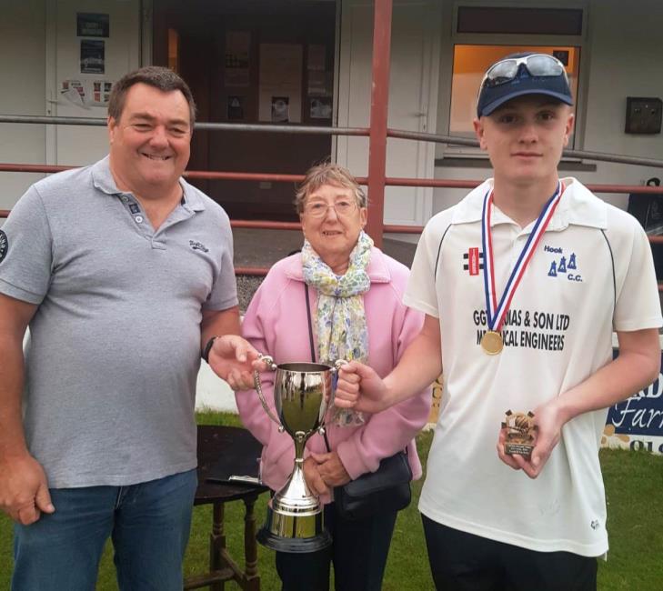 Man of the Match award - Mark and Hilary Williams with man of the match Oscar Willington